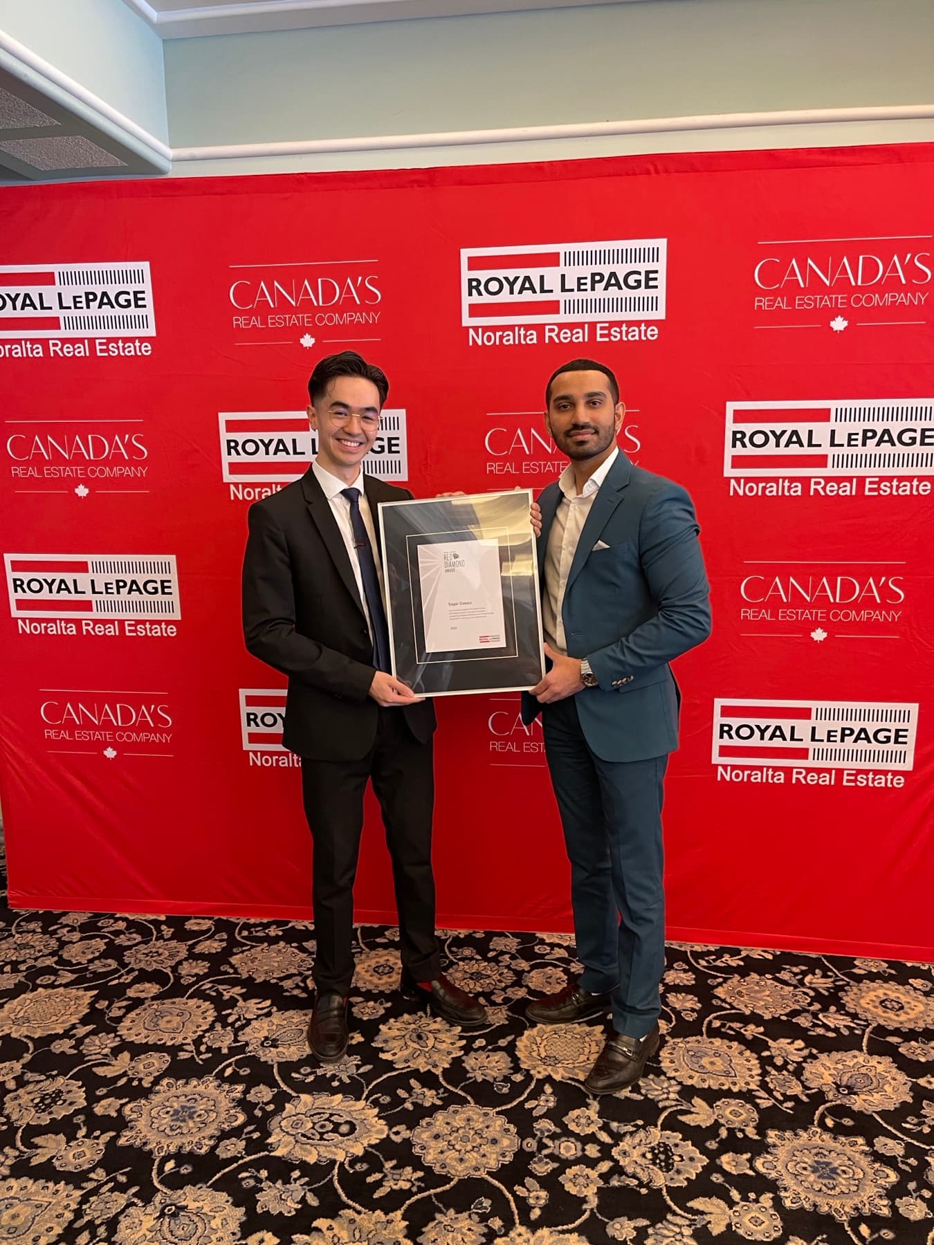 New Realty Group receiving an industry award